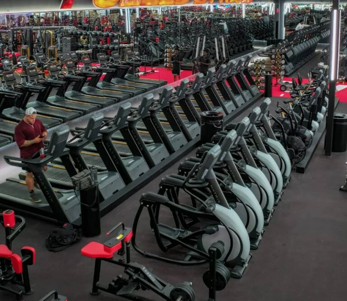 Cardio floor at Absolute Recomp Lewisville with treadmills and ellipticals