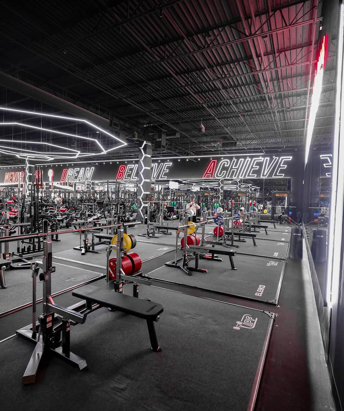 Absolute Recomp Fort Worth gym interior with strength equipment floor